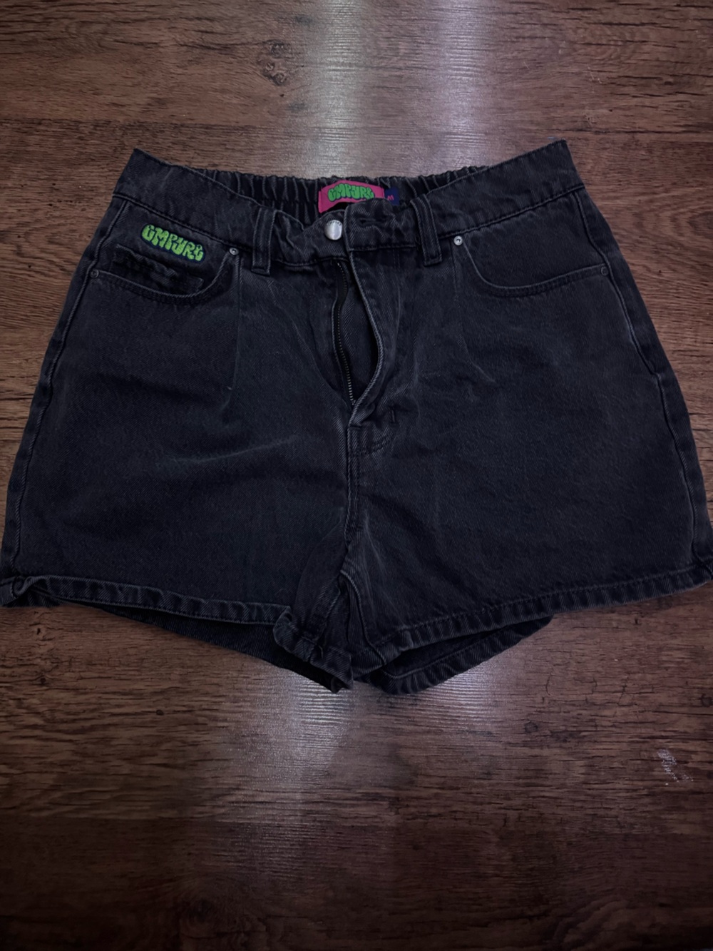 Zumiez Black Denim Shorts with Green Logo Stitching